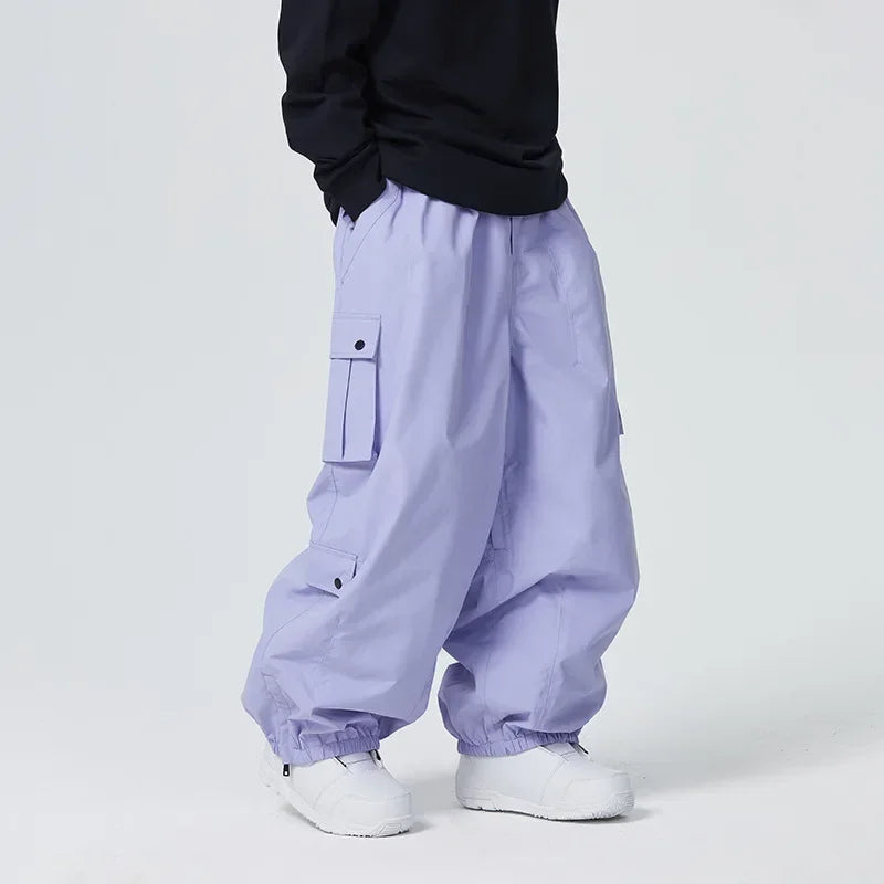 Outdoor Sport Snow Pants 2025 New Women Waterproof Ski Overalls Man Loose Skiing Pants Winter Pro Warm Windproof Couple Trousers