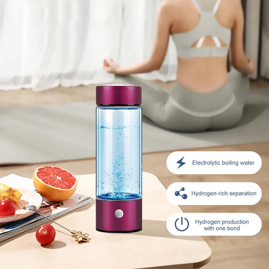 Drinking healthy water from hydrogen bottle at gym