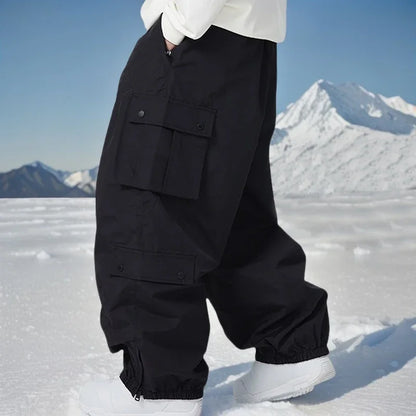 Outdoor Sport Snow Pants 2025 New Women Waterproof Ski Overalls Man Loose Skiing Pants Winter Pro Warm Windproof Couple Trousers