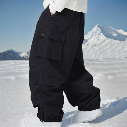Outdoor Sport Snow Pants 2025 New Women Waterproof Ski Overalls Man Loose Skiing Pants Winter Pro Warm Windproof Couple Trousers