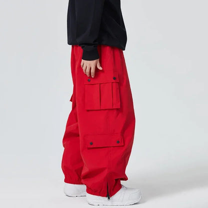 Outdoor Sport Snow Pants 2025 New Women Waterproof Ski Overalls Man Loose Skiing Pants Winter Pro Warm Windproof Couple Trousers