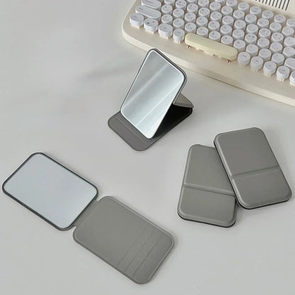 Desktop makeup mirror PU leather simple portable handheld makeup mirror foldable student compact cute pocket mirror